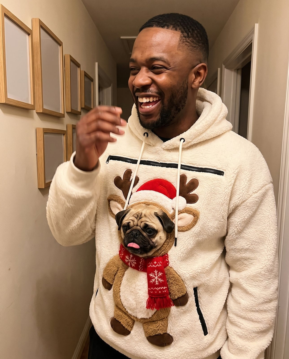 Customer laughing in the Reindeer pet pouch hoodie with a pug in the pouch